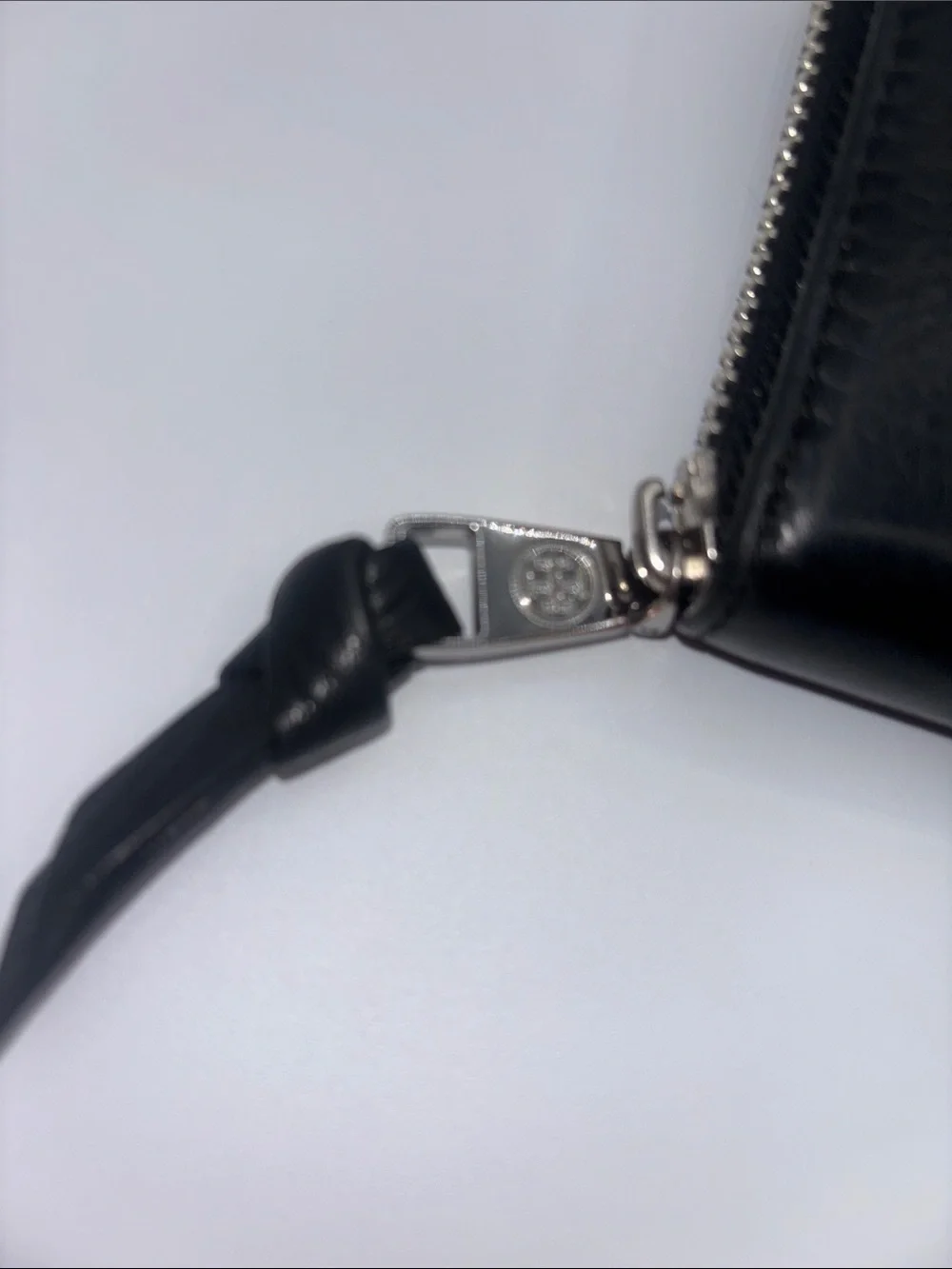 Tory Burch sleek zip